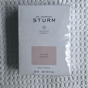 Dr. Barbara Sturm Glow Drops in White and Pink Packaging